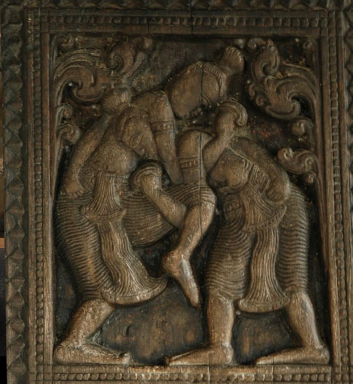 Angampora as shown in the historic Ambekke Devalaya's Wood Carvings