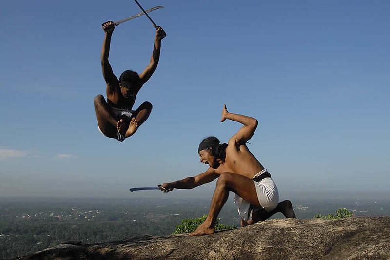 Sword demonstration atop Korathota hill top Sri Lanka