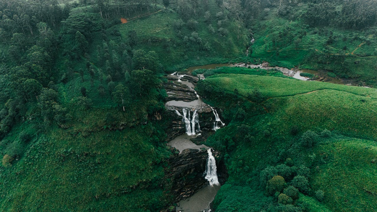 Waterfalls in the lush green mountains of Sri Lanka