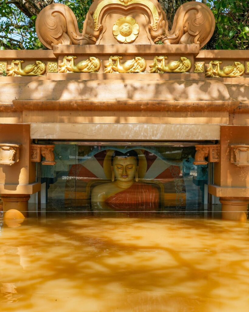 Buddha Statue is Flooded - Photograph by Thilina Kaluthotage